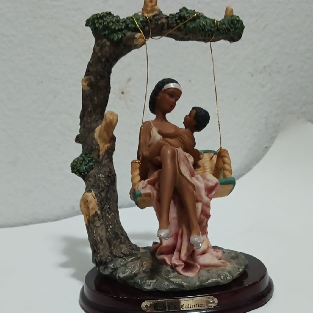 Mother and Child Figurine on Swing